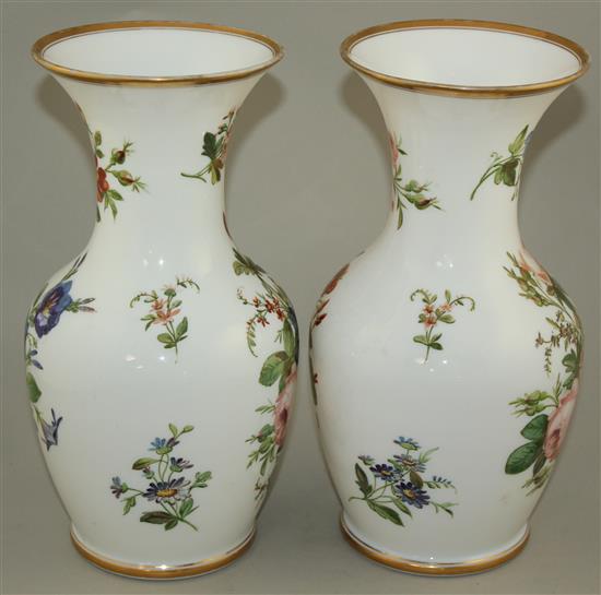 A pair of French enamelled opaline glass vases, mid 19th century, 29.5cm